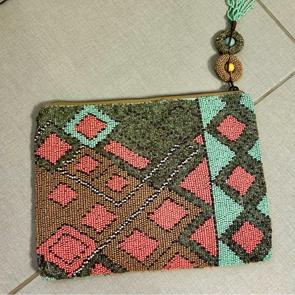 Anthropologie Jasper and Jeera Beaded Clutch with Tassel Zipper.     8x10